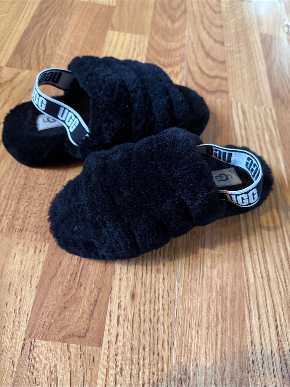 UGG Kids Black Fuzzy Slide Sandals with Branded Elastic Heel